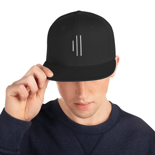 Black snapback hat for drummers by Cowbell & Groove, featuring embroidered minimalist groove bar logo — stylish gift for musicians and percussionists