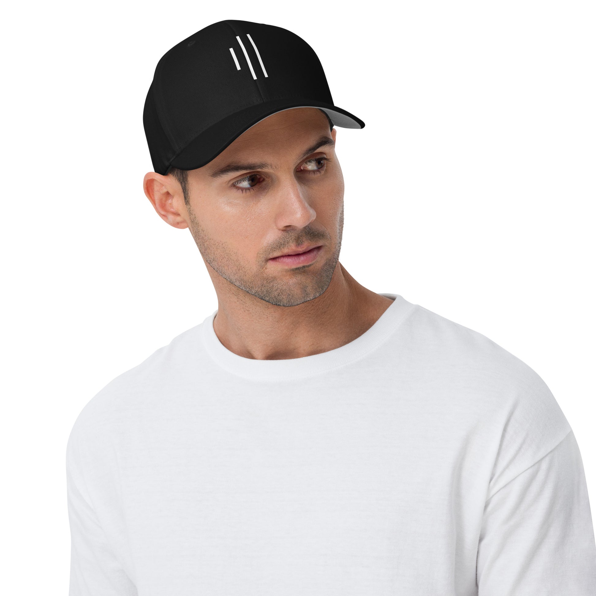 Man wearing black structured twill cap for drummers by Cowbell & Groove, angled front view showing printed groove bar logo — minimalist musician headwear